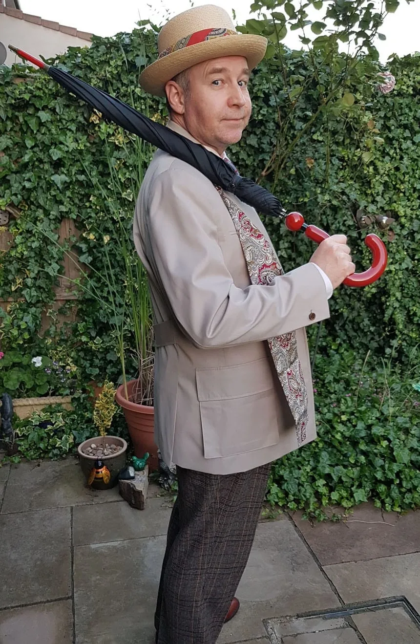 Side profile of the 7th Doctor Who jacket, highlighting its custom-tailored fit and lightweight drape.
