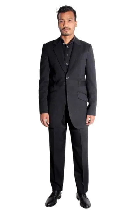 Never The Sinner suit tailored in a belted model with an off-centered vent.