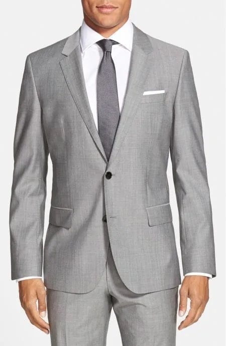 Mens 2 button suit in silk and wool blend. Jacket full front view.