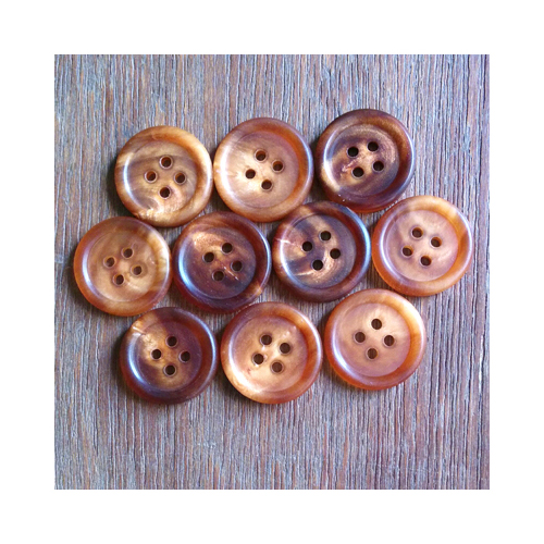 Hand made brown horn buttons for suits, jackets, coats, pants, skirts, and dresses.