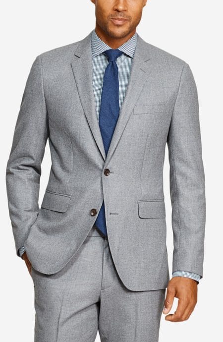 Mens grey flannel suit jacket, a close-up view.