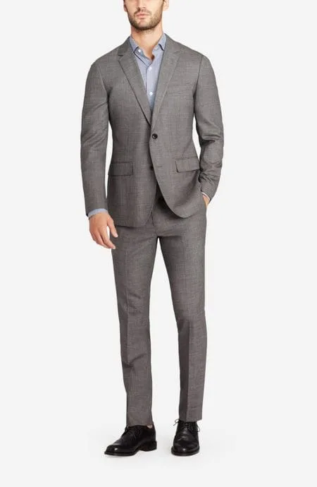 Mens pure new wool suit in light grey. A full front view.