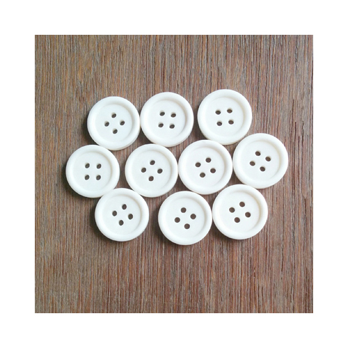 Hand made white horn buttons for suits, jackets, coats, pants, skirts, and dresses.