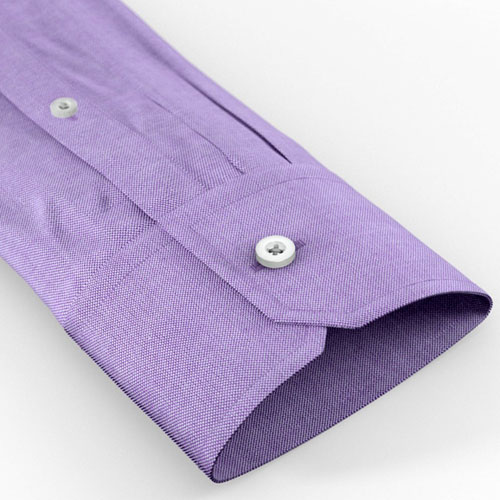 Shirt sleeves with a single button notched cuff.
