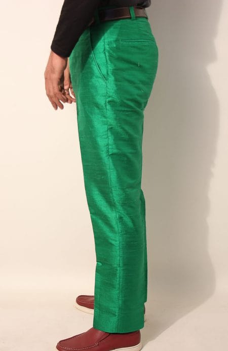 Side profile of The Bespoke Dupioni Silk Trousers, highlighting the unique texture and elegant drape of the fabric.