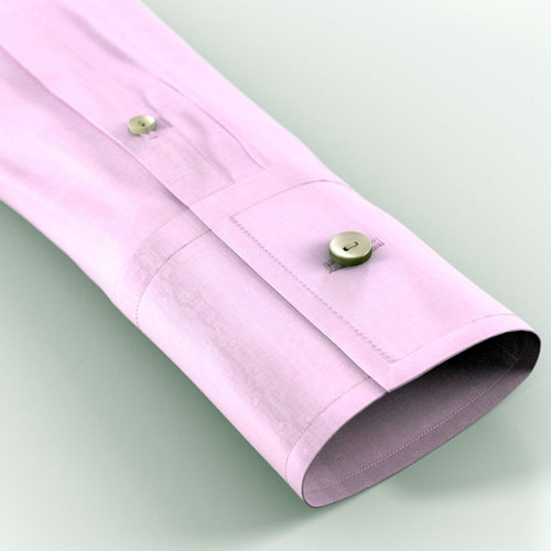 An image illustration of one sleeve placket button in a women’s shirt.