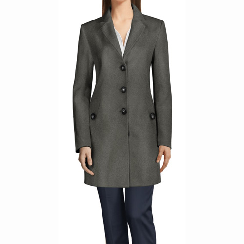 Diagonal with button closure hip pockets in a women’s coat.