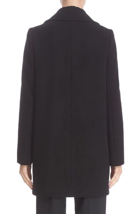 Double-breasted wool coat womens in the mid-length full back view.