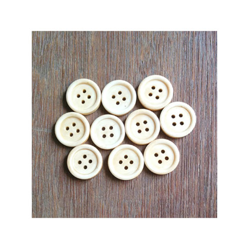 Hand made ivory horn buttons for garments.
