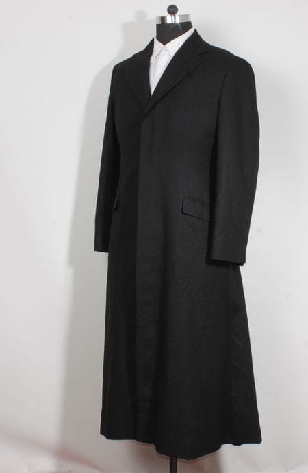 Womens long black trench coat in wool inspired by The Matrix Revolutions style a full side view.