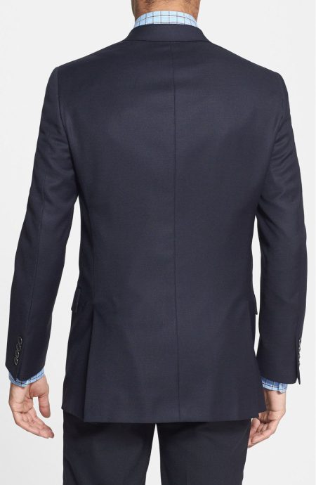 Essential navy blue blazer for men full back view.