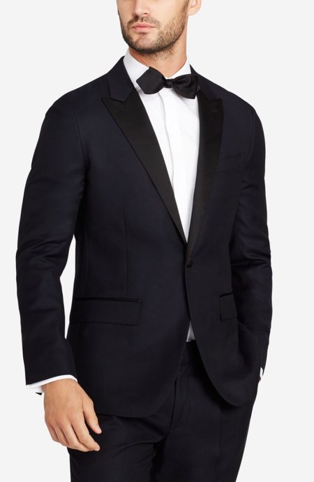 Slim fit Peak lapel tuxedo suit jacket front view.