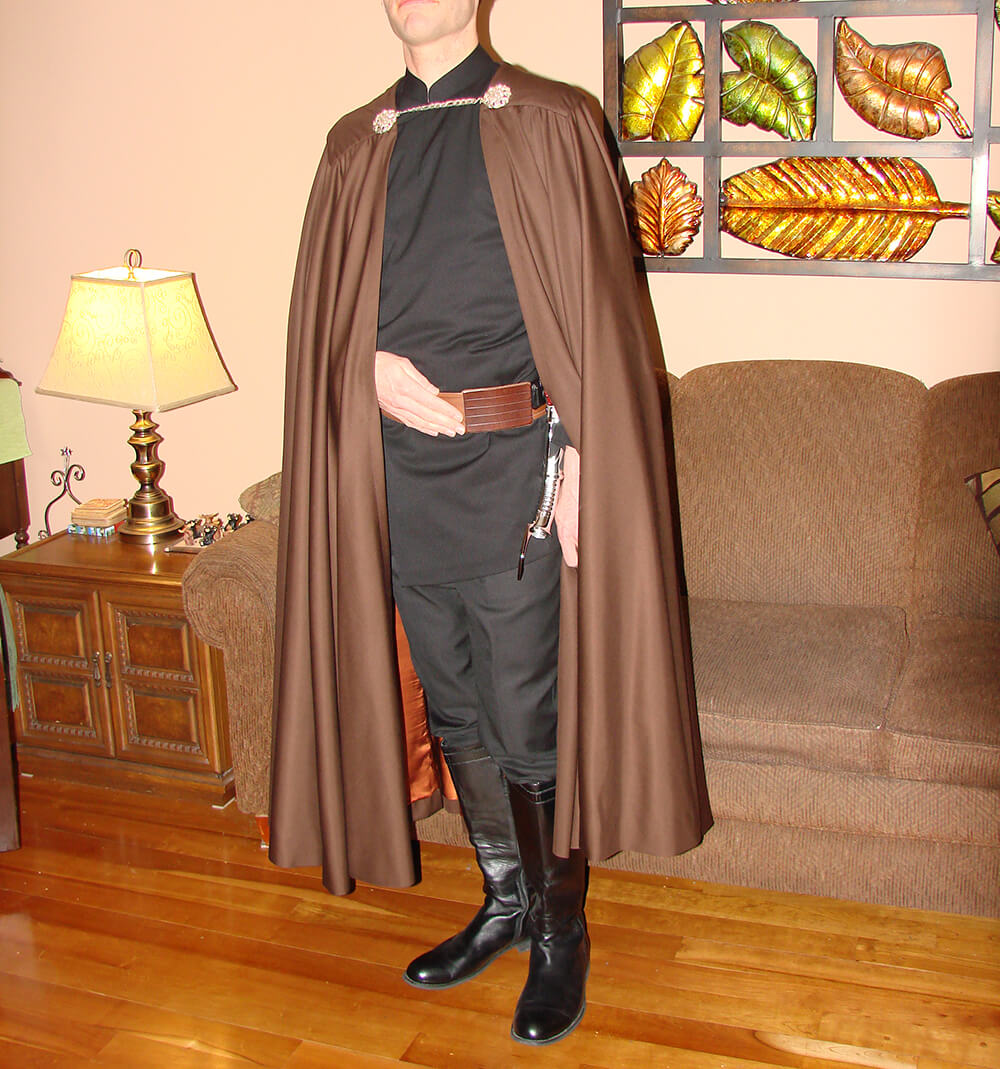 A satisfied customer wearing the custom-made Count Dooku cape and tunic, showing the final fit and screen-accurate look of the Star Wars costume.