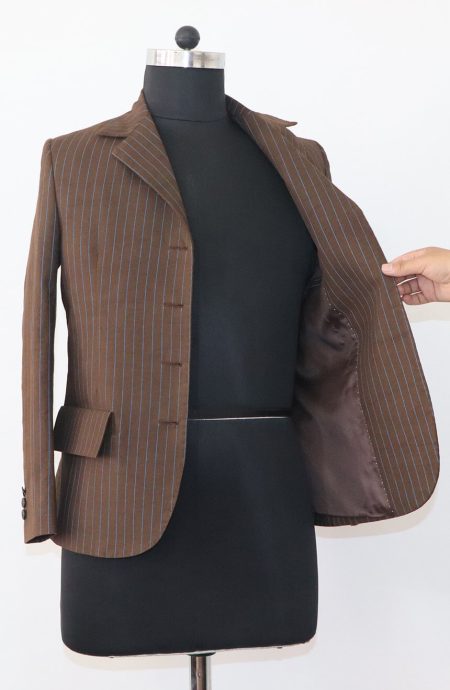 Interior view of the women's 10th Doctor pinstripe suit jacket, revealing the fully lined, high-quality construction and internal pockets.