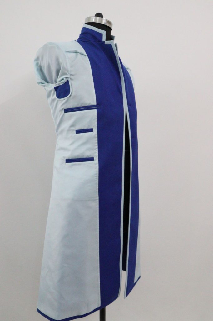 Time Lord Frock Coat in oxford blue wool, interior profile view showcasing interior pockets and underarm sweat pad for better protection, custom tailored by Baron Boutique.