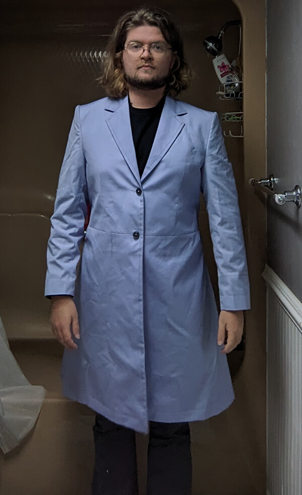 Customer wearing Baron Boutique’s Time Lord Test Frock Coat in a front full view with buttons closed, showcasing fit, cut, and tailoring details before final production.