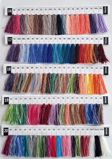 Baron Boutique custom cashmere color chart, rows 16 to 20: hand-dyed yarn tassels in heather purples, slate greys, teals and burnt oranges, plus white, black and undyed kora.