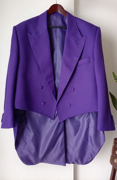Front view of the 1989 Joker tailcoat inspired by Jack Nicholson in Batman 1989, featuring wide peak lapels, double-breasted styling, and dramatic purple tuxedo tailoring.