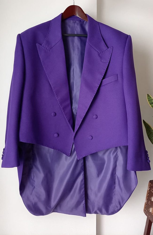 Front view of the 1989 Joker tailcoat inspired by Jack Nicholson in Batman 1989, featuring wide peak lapels, double-breasted styling, and dramatic purple tuxedo tailoring.