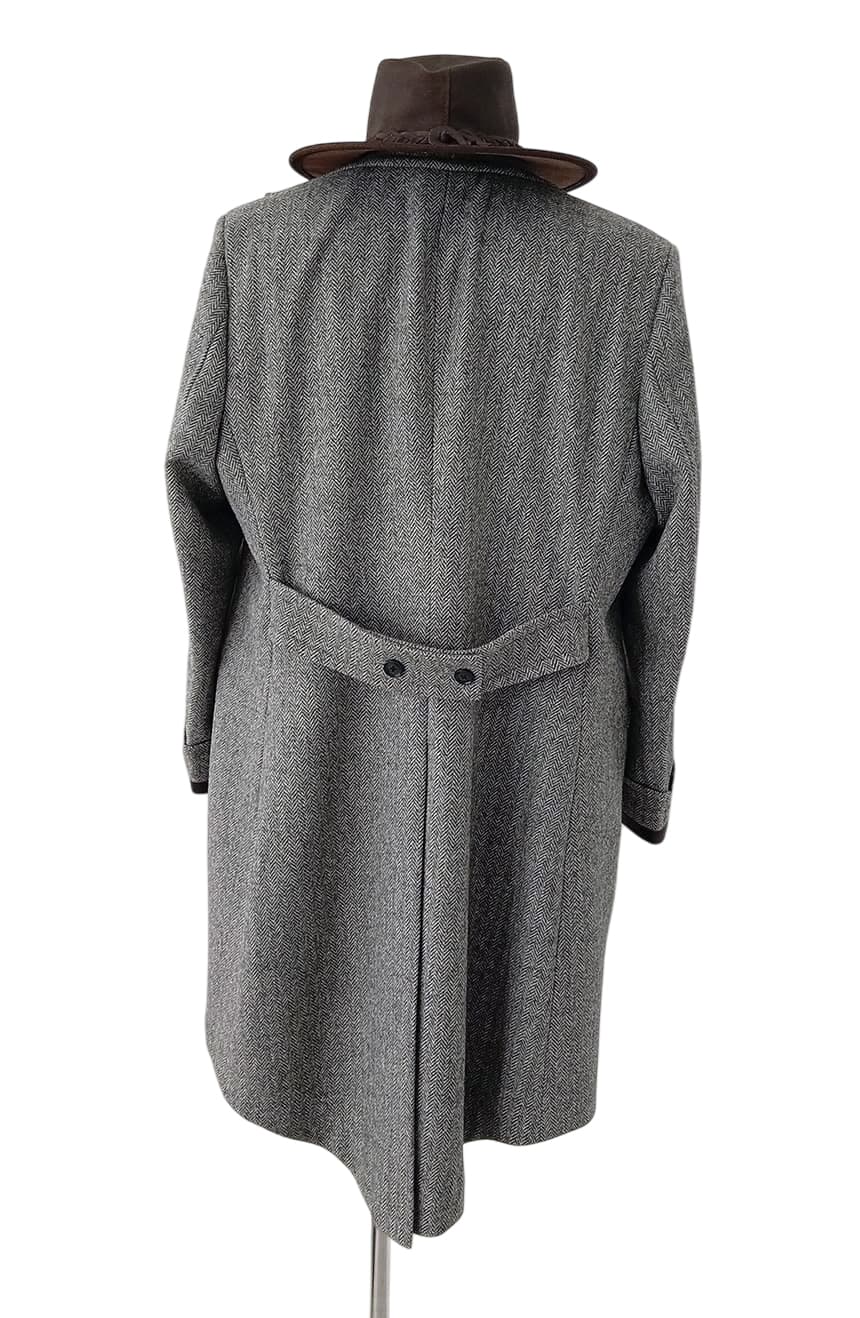 Back view of Fantastic inspired grey tweed coat featuring authentic herringbone texture, belted back detail, and timeless British tailoring for wizard-inspired fashion lovers.