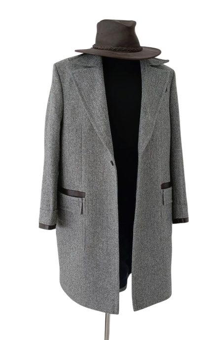 Front view of Newt inspired grey herringbone tweed coat with leather accents, tailored wizard-style overcoat crafted in British tweed for cosplay, fantasy fashion, and vintage enthusiasts.