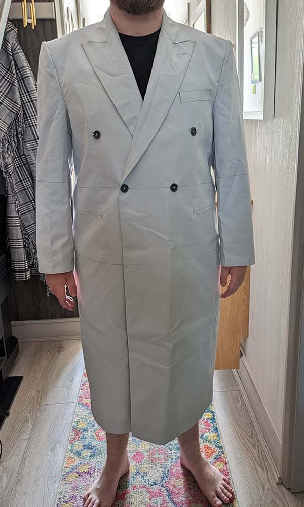 Front verification view of the 1989 Gotham villain prototype tailored in lightweight cotton utility fabric to check custom chest dimensions.