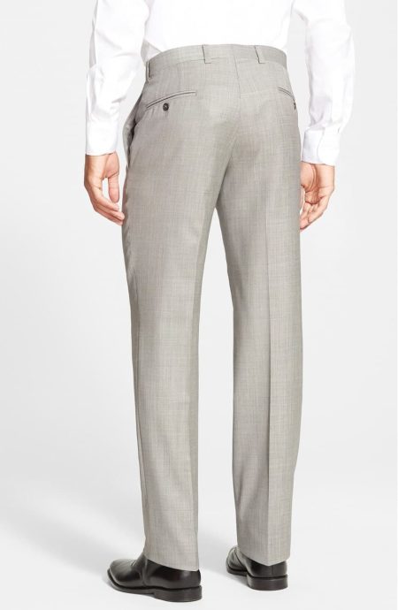 Back view of gray melange bespoke suit trousers featuring two welt back pockets, belt loops, clean tailored seat, and straight-leg silhouette.