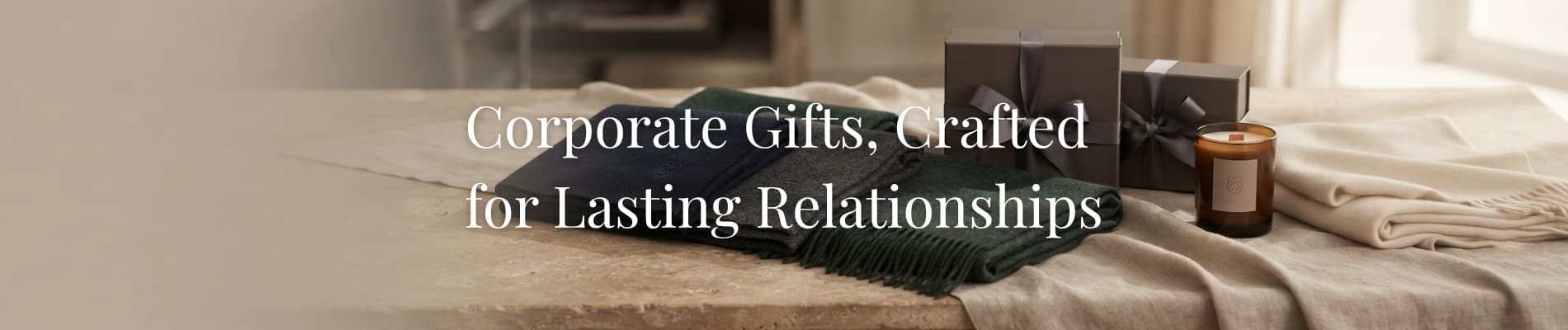 Luxury corporate cashmere gifts featuring bespoke handwoven 100% cashmere scarves with custom embroidered logos, presented in premium gift boxes and handcrafted in Nepal for executive and client gifting.