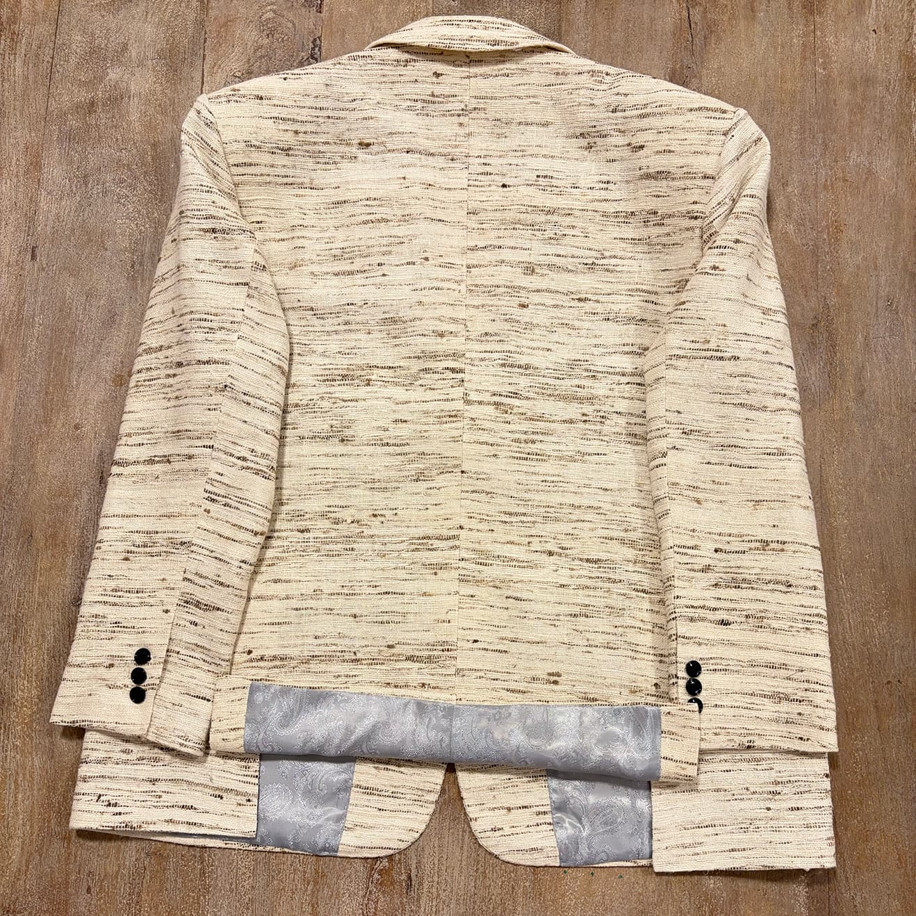 Men's raw silk blazer in unprocessed natural raw silk, full back view, double vent with satin lining, hand-stitched cuffs